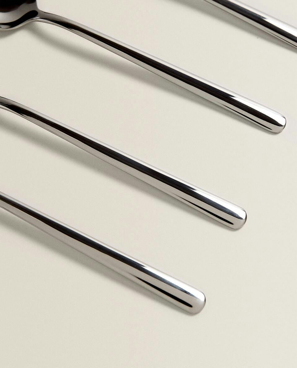 BOX OF 4 SHINY STEEL SPOONS