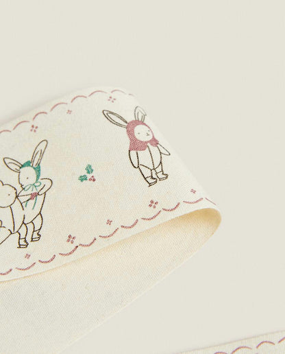 CHILDREN’S WRAPPING PAPER WITH CHRISTMAS BUNNY RABBITS