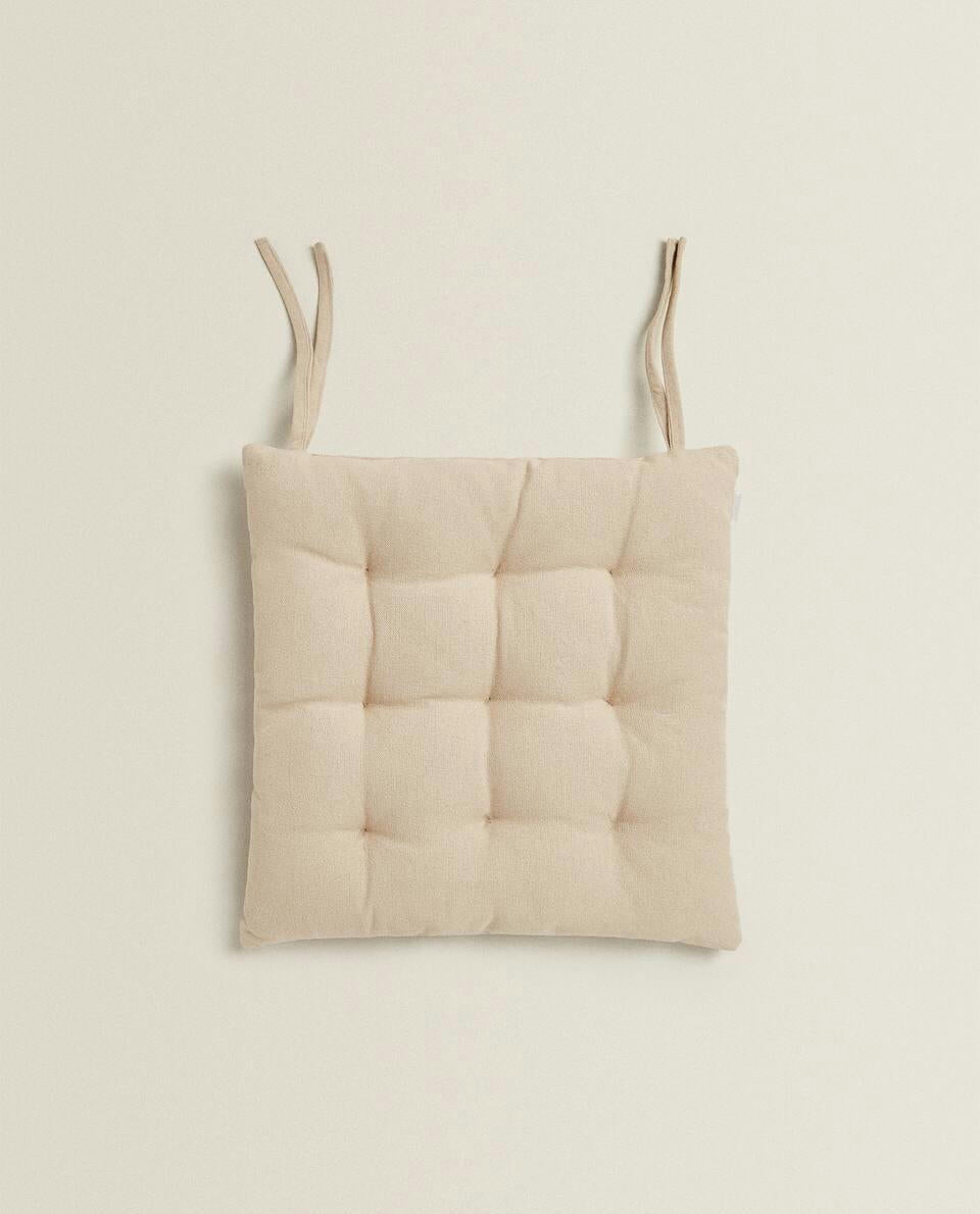 QUILTED CHAIR CUSHION WITH TIES